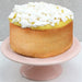 Lemon Drizzle Bento Cake - Bakerdays on a pink cake stand