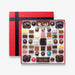 An open chocolate selection box containing 55 chocolates made by Harry Specters. The chocolates seen within this gift box are a colourful mix of white, milk, ruby, caramel, and dark chocolate with coffee beans, mini chocolate bars, and hot chocolate buttons with two Diwali themed chocolates.