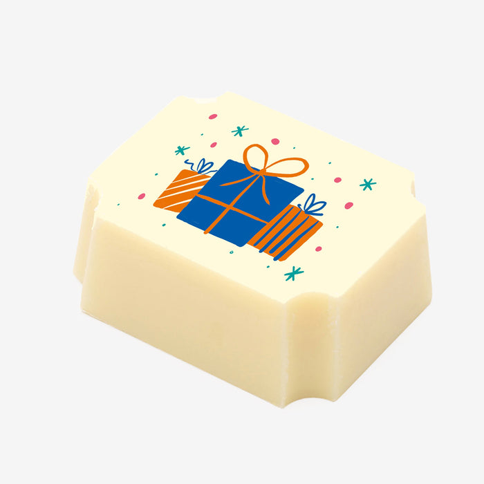  A white chocolate filled with dark chocolate ganache, made by Harry Specters, with an image of Birthday presents printed on the top.