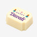 A white chocolate filled with dark chocolate ganache, made by Harry Specters, with a Happy Diwali message printed on the top.