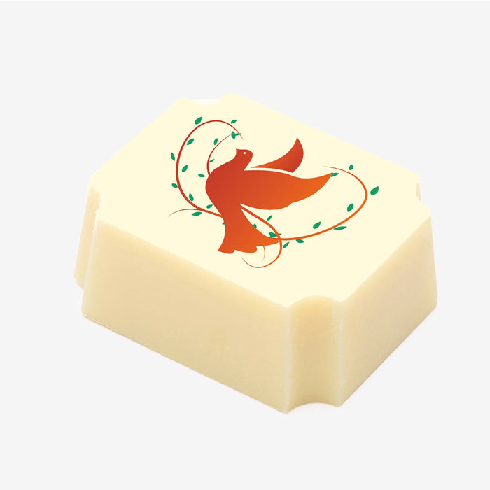 A white chocolate filled with dark chocolate ganache, made by Harry Specters, with a Wedding Wishes themed dove image printed on the top.